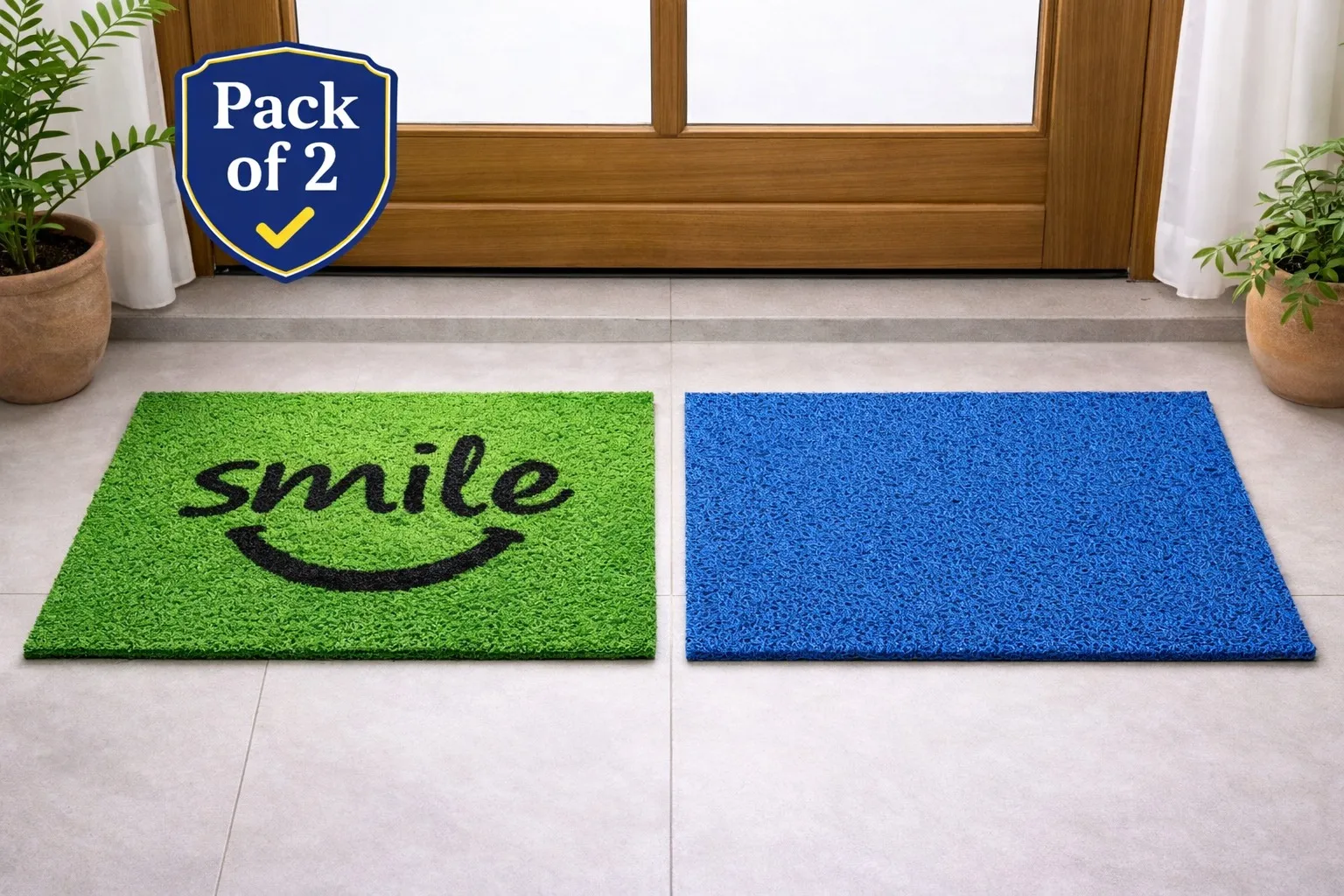 Pack of two mats: a green turf mat printed with the word smile, and a plain blue coil mat