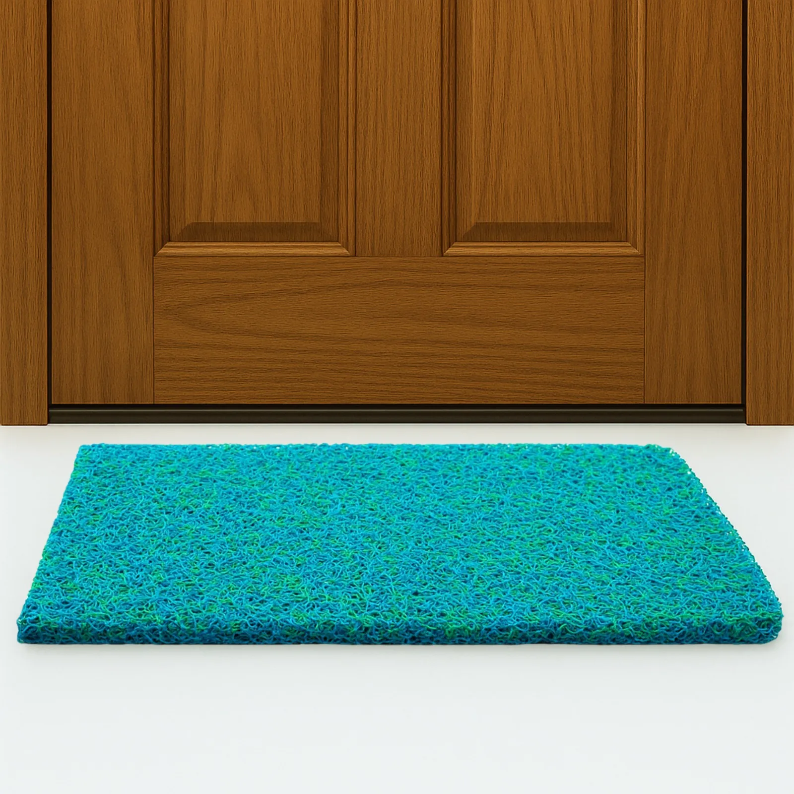 Teal PVC noodle coil door mat in front of a wooden door