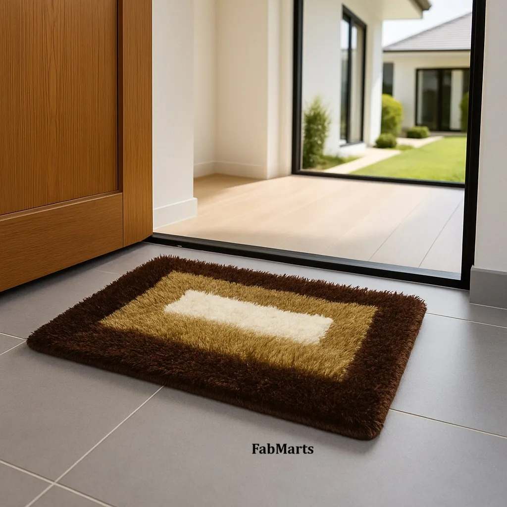 Brown and gold bordered shaggy door mat